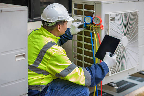 Professional Air Conditioning Repair technician working in Little Falls, MN